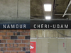 Mocked-up métro station signs that read "Namour" and "Cheri-UQAM"