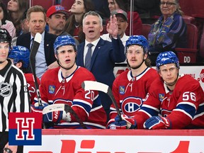 Martin St. Louis reacts behind the Montreal Canadiens bench