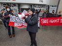 Concordia University student Angelica Antonakopoulos leads a protest by McGill and Concordia students against tuition hikes for out-of-province students outside Premier François Legault's Montreal office on Feb. 22, 2024.