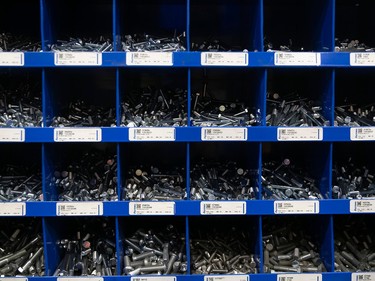 Several bins with machine bolts