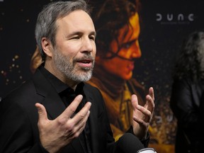 Director Denis Villeneuve speaks to reporters during the red carpet event for the Montreal première of the film Dune: Part Two, on Wednesday, Feb. 28, 2024.
