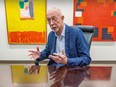 man sits at a desk