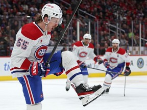 Canadiens' Michael Pezzetta is seen shouting for joy with his skate in the air and his stick raised after scoring Tuesday night in Washington.