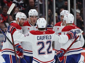 Juraj Slafkovsky #20 of the Montreal Canadiens celebrates his second goal of the game with teammates against the Washington Capitals during the third period at Capital One Arena on February 06, 2024 in Washington, DC.