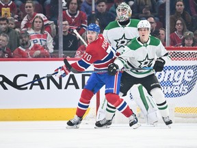 Canadiens' Tanner Pearson (70) and Nils Lundkvist (5) of the Dallas Stars battle for position in front of goaltender Jake Oettinger at the Bell Centre on Saturday, Feb. 10, 2024, in Montreal.