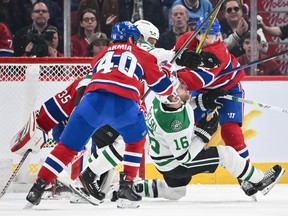 Dallas Stars' Joe Pavelski (16) is caught between Canadiens' Joel Armia (40) and Mike Matheson (8) at the Bell Centre on Saturday, Feb. 10, 2024, in Montreal.