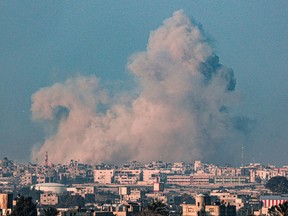 Smoke billows following Israeli bombardment in Rafah in the southern Gaza Strip on Sunday, Feb. 25, 2024, during the ongoing conflict between Israel and the Palestinian Hamas militant group.