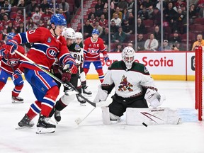 Canadiens' Juraj Slafkovsky skates after the puck near Coyotes goaltender Connor Ingram Tuesday night at the Bell Centre.