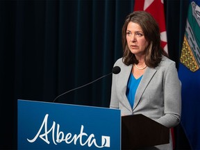 Premier Danielle Smith speaks to media at the McDougall Centre in Calgary on Thursday, Feb. 1, 2024.