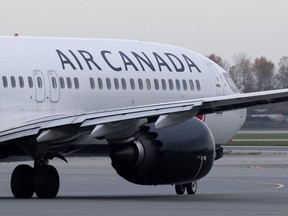 An Air Canada jet taxis at the airport in Vancouver, B.C., Wednesday, Nov. 15, 2023.