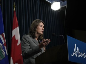 Alberta Premier Danielle Smith speaks during a news conference in Calgary on Friday, Oct. 13, 2023.