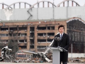 Canadian Prime Minister Justin Trudeau pauses during a ceremony at Hostomel Airport in Kyiv, Ukraine, on Saturday, Feb. 24, 2024. The ceremony was to mark the second anniversary of the start of the war in Ukraine.