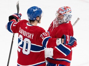 Canadiens' Juraj Slafkovsky congratulates goaltender Cayden Primeau.