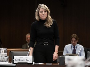 Mélanie Joly waits to appear at the Standing Committee on Foreign Affairs and International Development, in Ottawa, Wednesday, Feb. 7, 2024.
