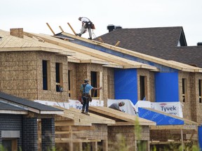 New homes are constructed in Ottawa on Monday, Aug. 14, 2023.