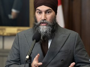 New Democratic Party Leader Jagmeet Singh speaks with reporters in the Foyer of the House of Commons before Question Period, Monday, Feb. 5, 2024 in Ottawa.