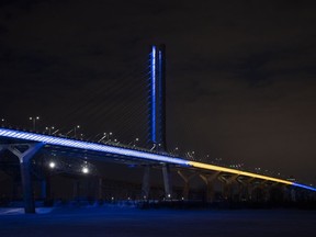 The Samuel de Champlain Bridge is shown lit up in the colours of Ukraine in Montreal on Feb. 26, 2022, in a show of support from the government of Canada for the Ukrainian people and all Ukrainian Canadians.