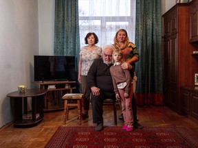 Former wife Olha, 35, father Arthur, 64, mother Sofia, 69, and daughter Eva, 7, await the return of Rostyslav at their apartment in Kyiv, Ukraine on Feb. 14, 2024.