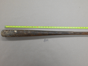 A photo of the baseball bat believed to have been used to kill George Riches in LaSalle in 2021. Akong Yves Fonbah is charged with Riches's murder. The victim's DNA was found on the bat.