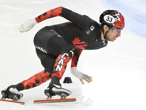 William Dandjinou of Montreal skates to a first-place finish during the 1,000-metre final race at the ISU Four Continents Short Track Speedskating Championships in Laval on Nov. 5, 2023.