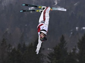 Émile Nadeau of Prévost jumps to a third place finish at the FIS freestyle world cup men's aerials in Lac-Beauport on Saturday, Feb. 10, 2024.