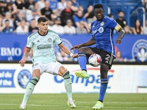 CF Montréal's Victor Wanyama, right, wins the ball from Atlanta United's Miguel Berry during game at Saputo Stadium last year.