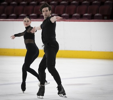 Kelly Ann Laurin and Loucas Ethier on the ice during practice of their pairs routine at the Bell Centre on Wednesday, March 6, 2024.