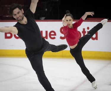 Deanna Stellato-Dudek and Maxime Deschamps on the ice during practice of their pairs routine at the Bell Centre on Wednesday, March 6, 2024.