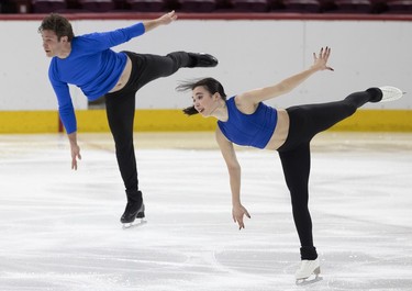 Lia Pereira and Trennt Michaud on the ice during practice of their pairs routine at the Bell centre on Wednesday, March 6, 2024.