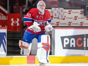 Canadiens goaltender Cayden Primeau returns to the ice after being named first star of the game following his shutout over the Blue Jackets Tuesday night at the Bell Centre.