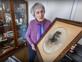 Jane Litwack looks at a photo of her grandfather when he was a soldier in the army of the Austro-Hungarian Empire, at her home in N.D.G. on Thursday March 7, 2024.