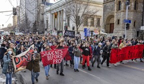 Students march on Shebrooke St. in Montreal on Wednesday, March 13, 2024 in protest against government tuition hikes for out-of-town students.