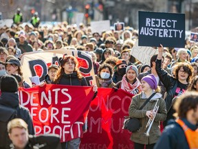 Students march on Shebrooke St. in Montreal on Wednesday March 13, 2024 in protest against government tuition hikes for out-of-town students.