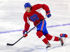 Canadiens prospect David Reinbacher is seen in full stride during Rocket practice in Laval on Tuesday.