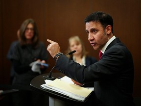 Justice Minister Arif Virani holds a press conference regarding the new online harms bill on Parliament Hill Feb. 26.