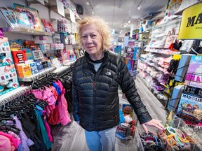 Barbara Vininsky stands in the aisle of a small store