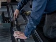 A mechanic works at Mirabel airport.