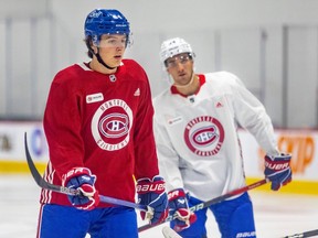 Canadiens first-round draft choices David Reinbacher, left, and Logan Mailloux take part in rookie camp last September.
