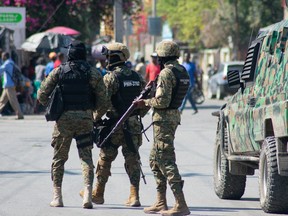 Haitian police officers deploy in Port-au-Prince, Haiti, on March 9, 2024.