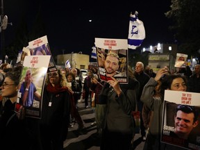 Relatives and supporters of hostages held by Hamas in the Gaza Strip since the Oct.7, 2023 attacks rally in front of the Israeli Parliament (Knesset) to demand their release, on March 13, 2024, amid the ongoing conflict between Israel and the Palestinian militant group.