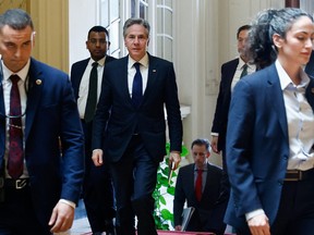 U.S. Secretary of State Antony Blinken walks to meet with Egyptian Foreign Minister Sameh Shoukry, in Cairo, on March 21, 2024.