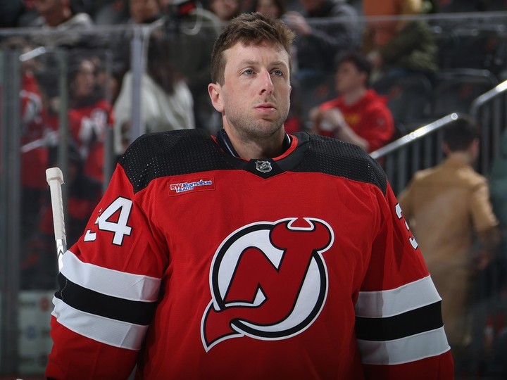  Jake Allen #34 of the New Jersey Devils prepares to play against the Winnipeg Jets at Prudential Center on March 21 in Newark, N.J.