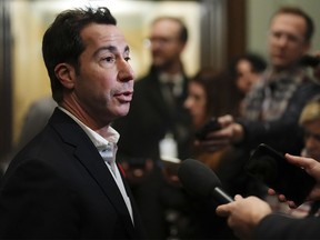 Liberal MP Anthony Housefather talks to reporters as he arrives at a caucus meeting in Ottawa on Nov. 8, 2023. Housefather says MPs should be encouraged to speak their own minds and convey the views of their constituents on important issues.