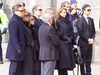The Mulroney family waits as the casket carrying former prime minister Brian Mulroney is taken from the hearse carrying it to St. Patrick’s Basilica in Montreal on March 21, 2024