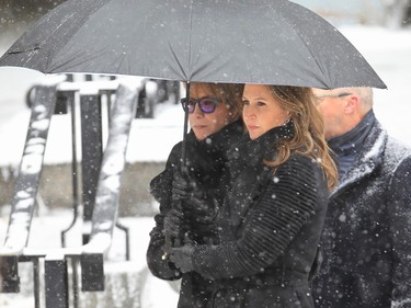 Mila Mulroney and daughter Caroline watch as the casket of former prime minister Brian Mulroney arrives at Notre-Dame Basilica of Montreal on Saturday, March 23, 2024.