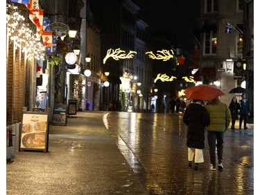 Pedestrians had the streets to themselves as a light rain kept people away during a nuit blanche in the Old Port in Montreal on Saturday, March 2, 2024.