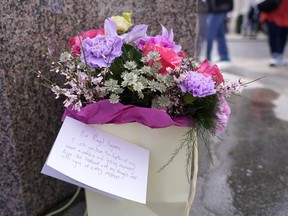Flowers and a letter to the Princess of Wales were left outside Windsor Castle in Windsor, England, Saturday, March 23, 2024.