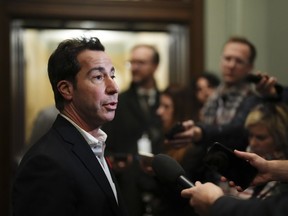 Liberal MP Anthony Housefather talks to reporters as he arrives to a caucus meeting in Ottawa on Wednesday, Nov. 8, 2023.