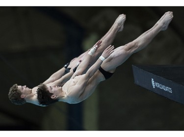 Nathan Zsombor-Murray of Pointe-Clair and Rylan Wiens of Canada compete during the men's 10m synchronized platform final at the World Aquatics Diving World Cup 2024 in Montreal on Sunday, March 3, 2024.