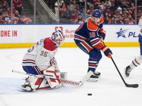 Montreal Canadiens goalie Sam Montembeault (35) makes the save on Edmonton Oilers' Zach Hyman